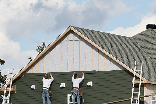Professional Siding Replacement technician working in Colmar, PA
